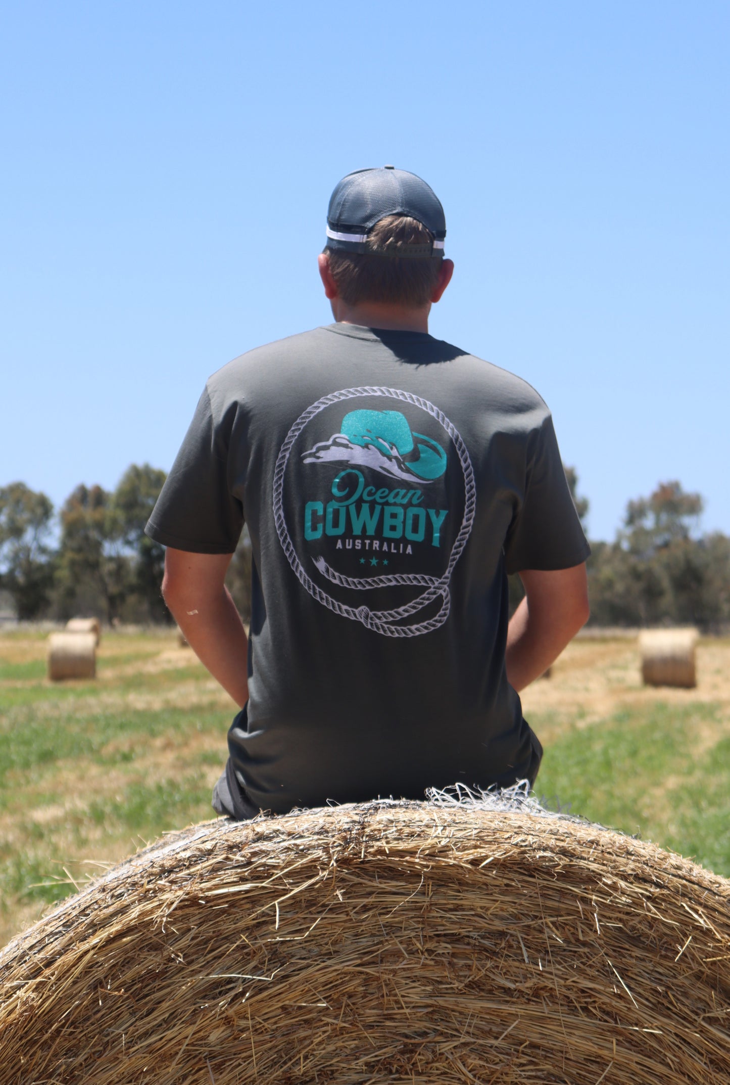 Ocean Cowboy Charcoal Tee - Teal Logo