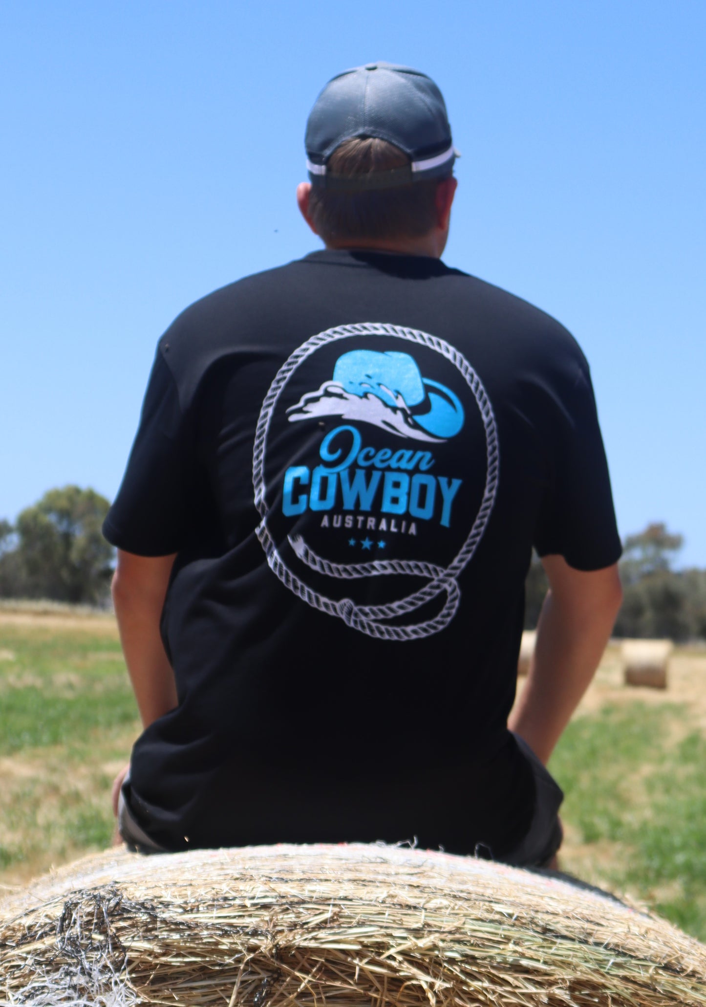 Ocean Cowboy Black Tee - Blue Logo