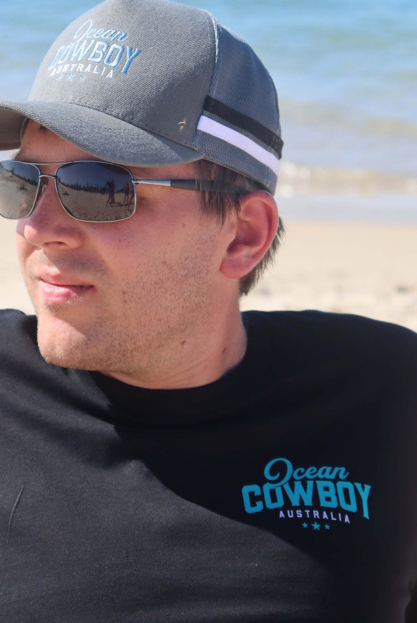 Ocean Cowboy Black Tee - Teal Logo
