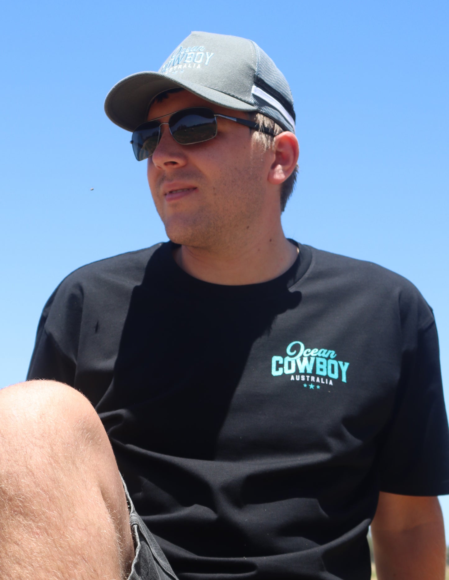 Ocean Cowboy Black Tee - Teal Logo