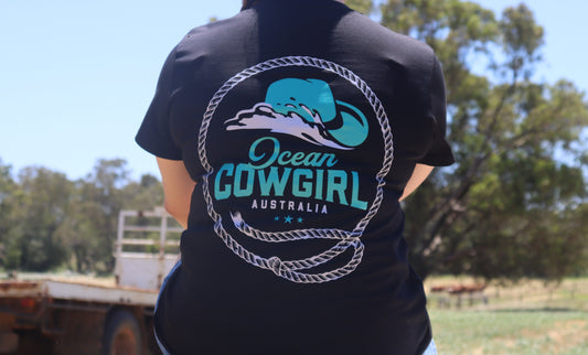 Ocean Cowgirl Black Tee - Teal Logo